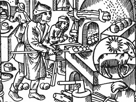 Une gravure sur bois de 1541 représentant une boulangerie : grain, huche, four et pains, posés comme le travail du mois de décembre.